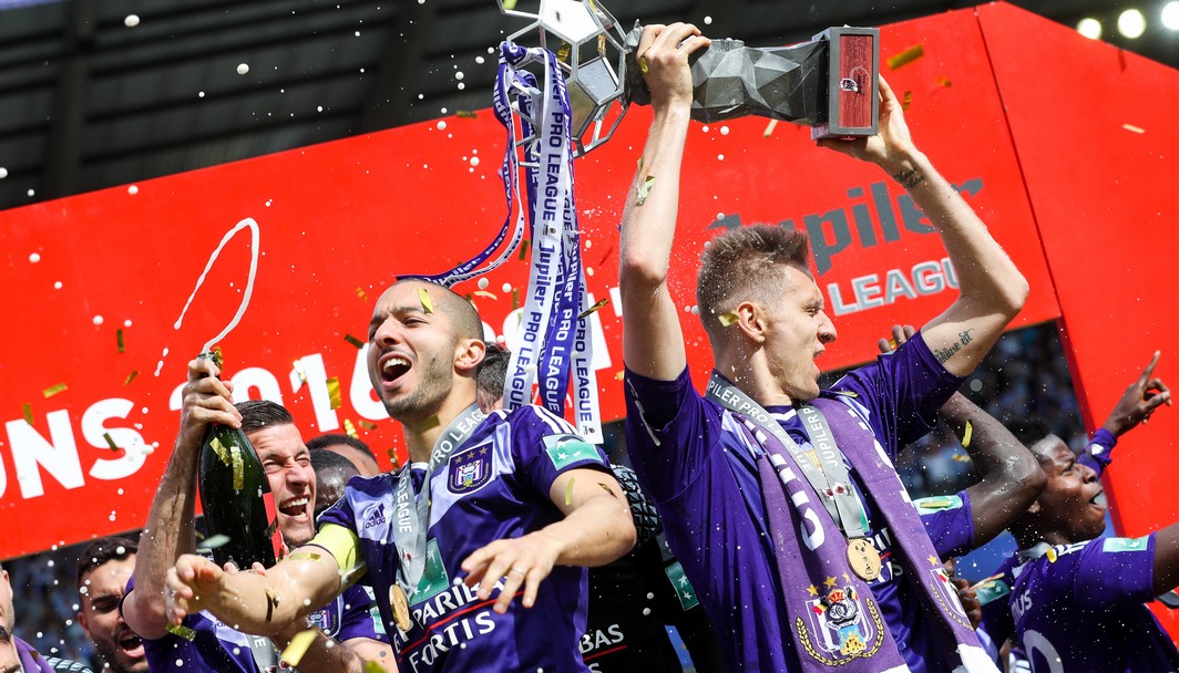 Anderlecht's Sofiane Hanni and Anderlecht's Lukasz Teodorczyk pictured during celebrations for the 34th title of Sporting Anderlecht after the Jupiler Pro League match between RSC Anderlecht and KV Oostende, in Brussels, Sunday 21 May 2017, on the last day of the Play-off 1 of the Belgian soccer championship. BELGA PHOTO VIRGINIE LEFOUR