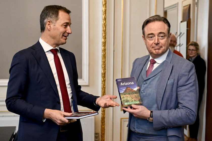 Outgoing Prime Minister Alexander De Croo and Newly appointed Prime Minister Bart De Wever pictured during the passing of power to the new Minister, at the Prime Minister's cabinet, Monday 03 February 2025, in Brussels. Negotiators from the five parties that make up the Arizona coalition - the N-VA, MR, Engagés, Vooruit and CD&V - reached a government agreement on Friday evening. BELGA PHOTO DIRK WAEM